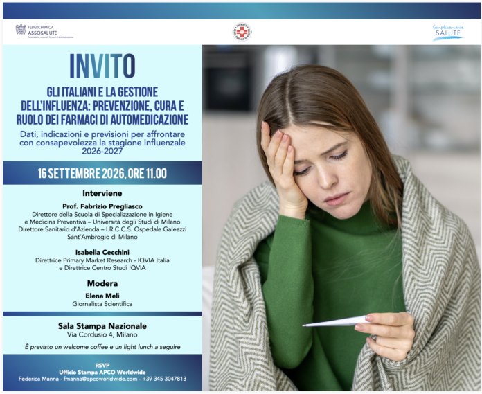 Donna che controlla la temperatura con un termometro mostrando segni di malessere, immagine rappresentativa dell'influenza.