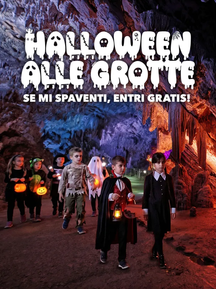 Foto di bambini mascherati con lanterne in un ambiente naturale sotterraneo, scena di Halloween alle Grotte di Pertosa-Auletta.